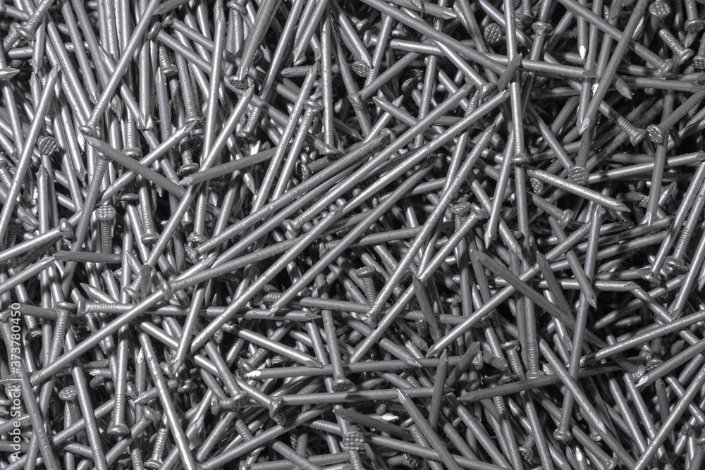 Metal Nails. Texture. Many new long iron nails. Background for wallpaper.