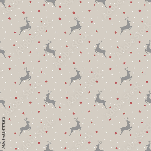 Christmas seamless pattern with reindeer on gray background. Vector illustration.