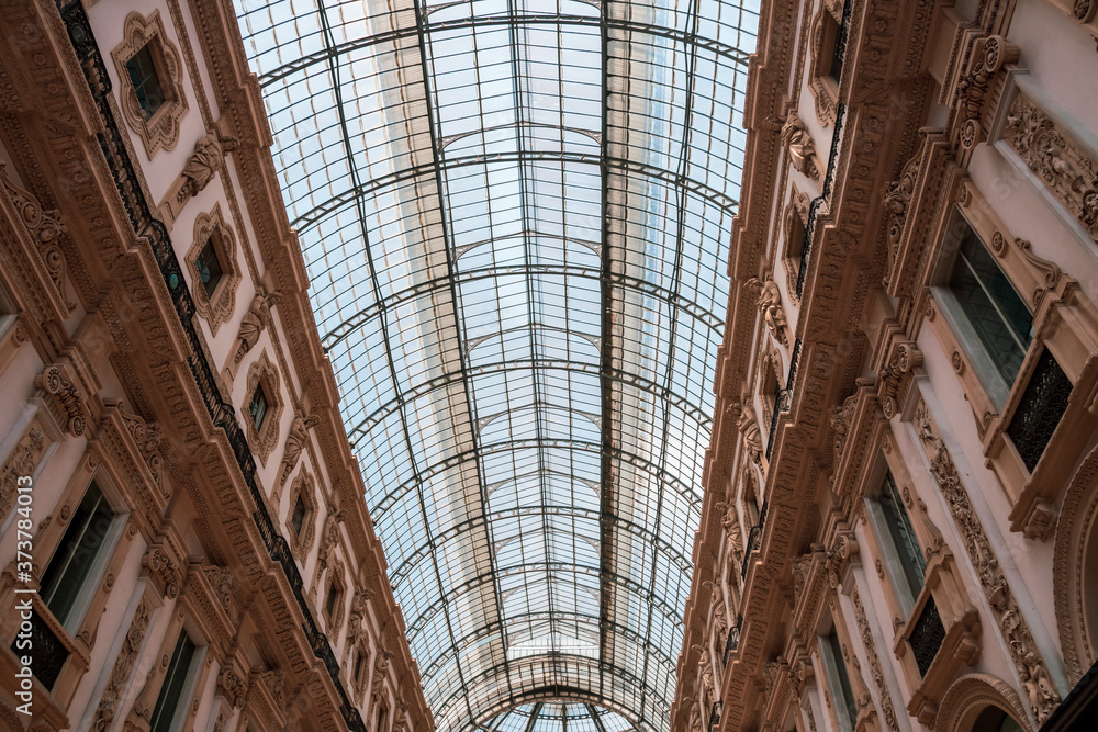 Glass dome of Galleria Vittorio Emanuele in Milan, Italy. Vaulted glass ceiling