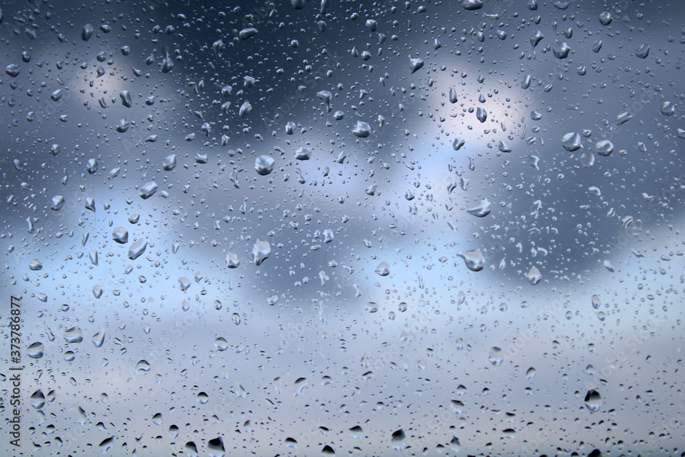 dark stormy weather and drops on the window dark stormy weather and drops on the window