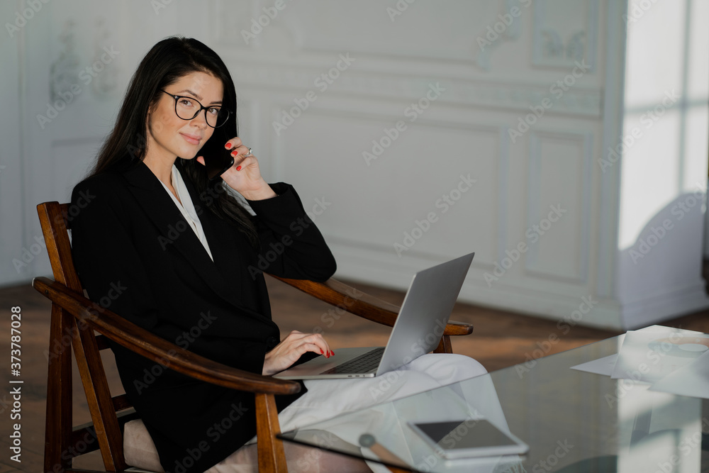 young businesswoman talking on phone young businesswoman talking on phone
