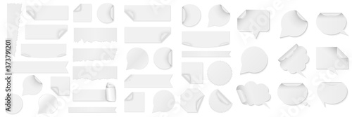 Bundle of white paper stickers of different shapes