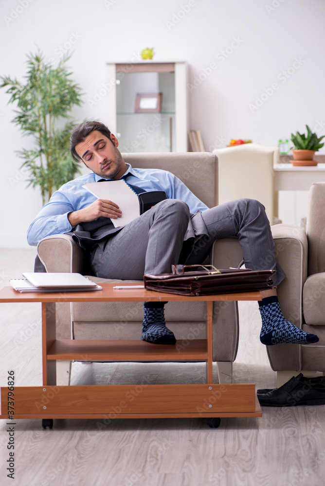 Tired businessman employee working from home Tired businessman employee working from home