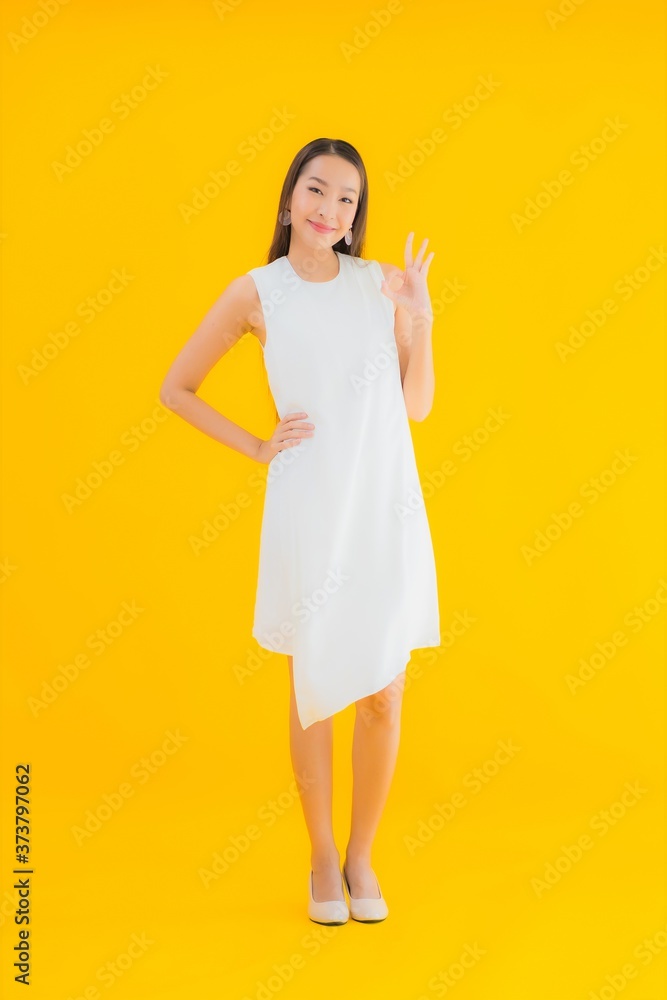 Portrait beautiful young asian woman in action Portrait beautiful young asian woman in action