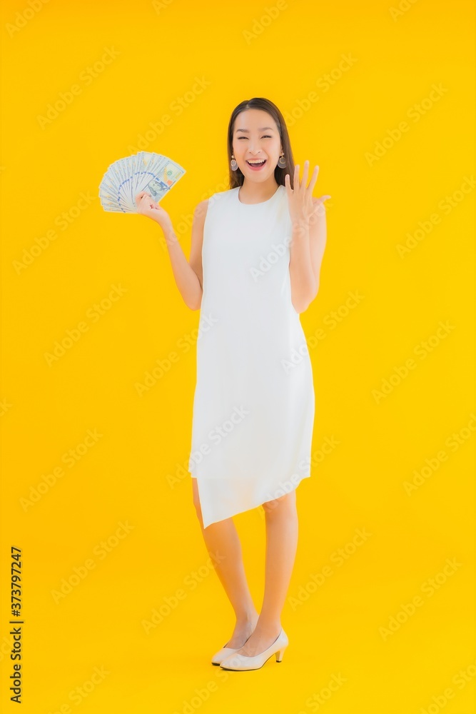 Portrait beautiful young asian woman with money cash Portrait beautiful young asian woman with money cash