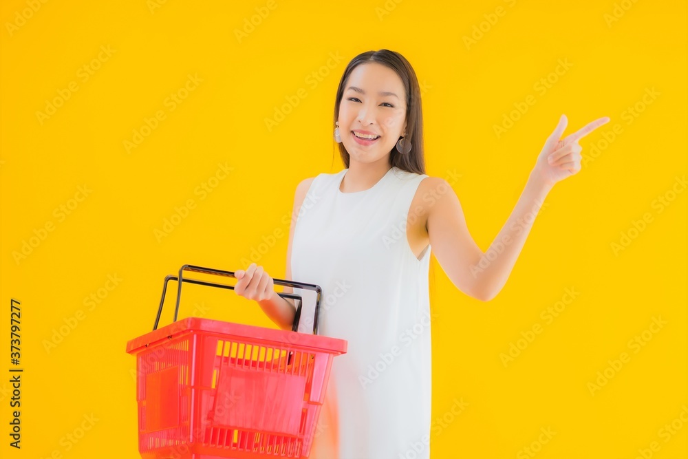 Portrait beautiful young asian woman with grocery basket Portrait beautiful young asian woman with grocery basket