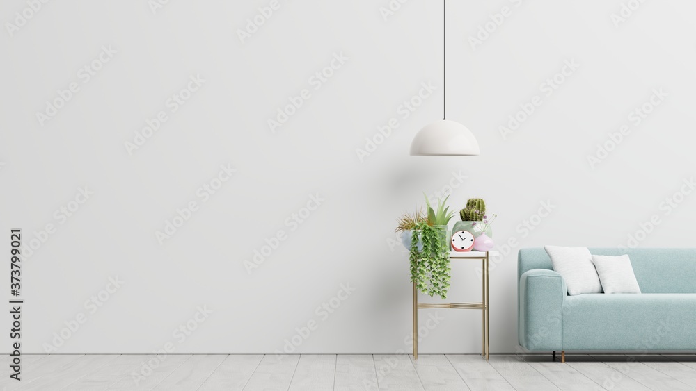 Empty living room with blue sofa, plants and table on empty white wall background. - obrazy, fototapety, plakaty 