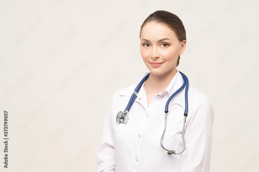Portrait of an attractive young female doctor in white coat Portrait of an attractive young female doctor in white coat