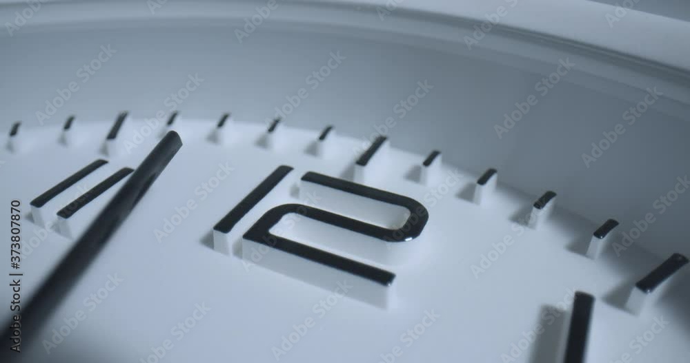Seconds Pass 12 O'Clock. Extreme macro wide angle close up as the ...
