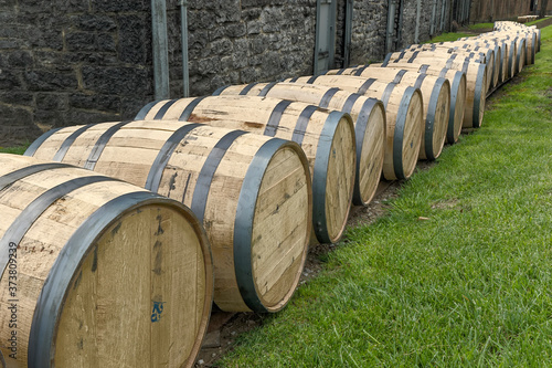 Line of bourbon barrels, Woodford Reserve distillery, Versailles, Kentucky. (Editorial Use Only) photo