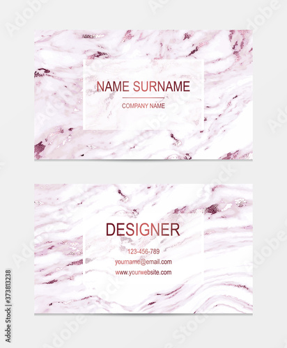 Marble design business cards with rose gold foil wavy stripes.