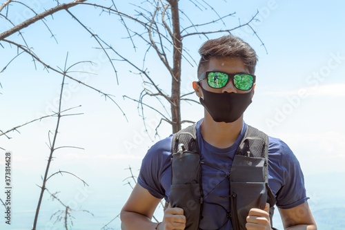 Safe outdoor activities with face mask photo