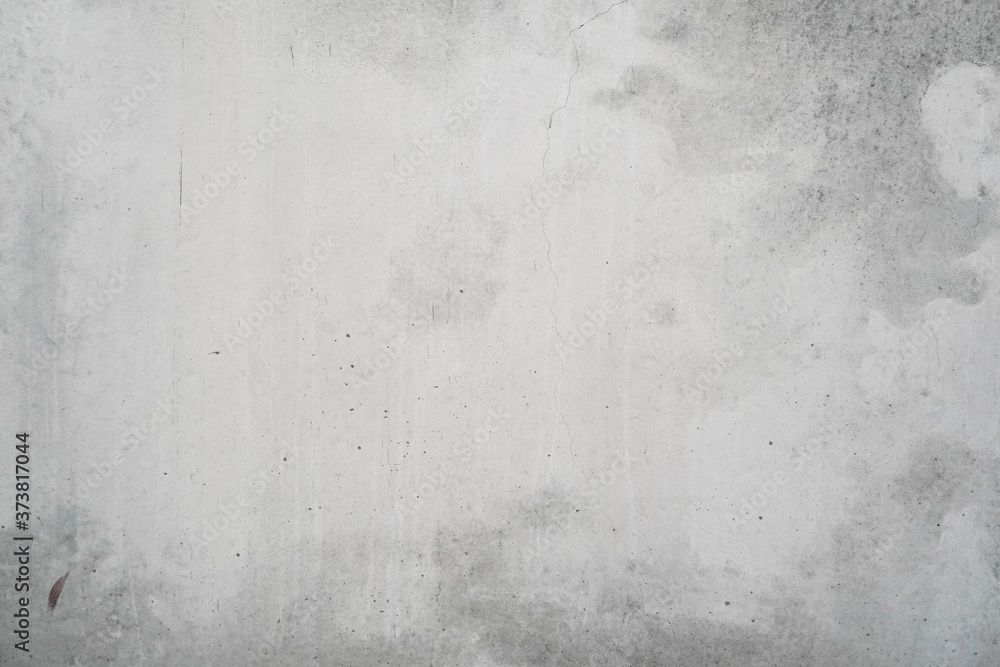 Texture of a smooth gray concrete wall as background or wallpaper. Close up of concrete wall with rough texture. Cement texture. Texture of a smooth gray concrete wall as background or wallpaper. Close up of concrete wall with rough texture. Cement texture.