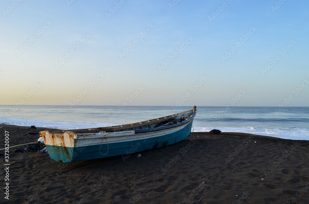 A fishing boat on the beach