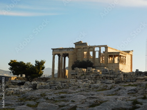 The Erectheion temple, in the ancient Acropolis, under the morning light, in Athens, Greece
