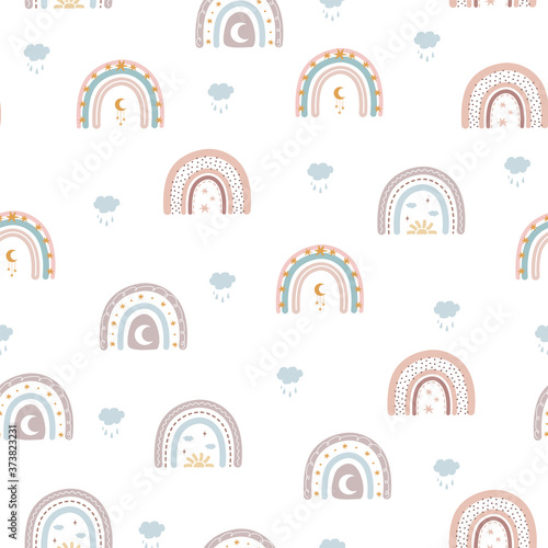 Trendy rainbows in boho style in different color. Vector seamless pattern. Children illustrations for holidays. Doodle art elements. Design for fabric, postcards, bed linens, pillows and wallpaper.