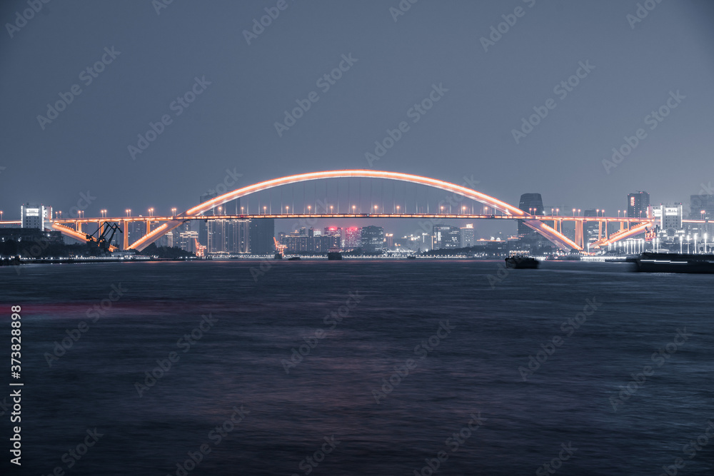 Naklejka premium Night view of Lupu bridge, in Shanghai, China.