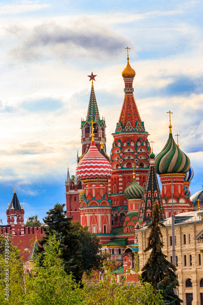 St. Basil's Cathedral and Spasskaya tower of Kremlin on Red Square in Moscow, Russia St. Basil's Cathedral and Spasskaya tower of Kremlin on Red Square in Moscow, Russia