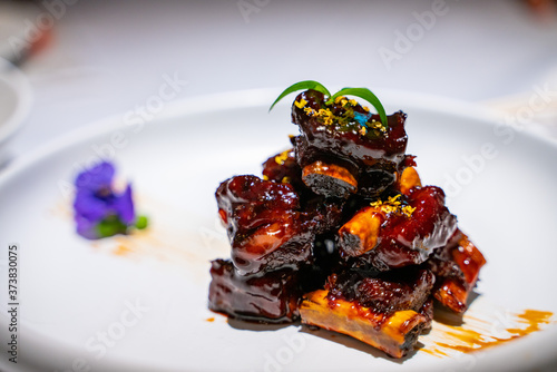 Photography Sweet and sour pork ribs, a traditional dish in Shanghai, China.