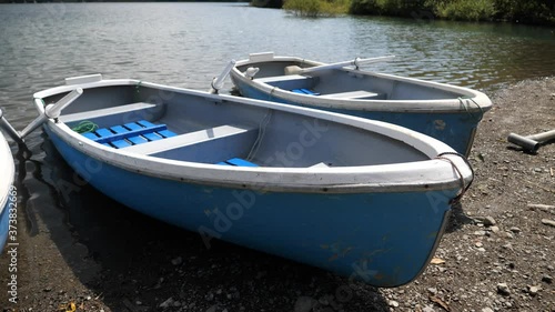 Wallpaper Mural Old boats lined up next to lake Saiko in Japan. Torontodigital.ca