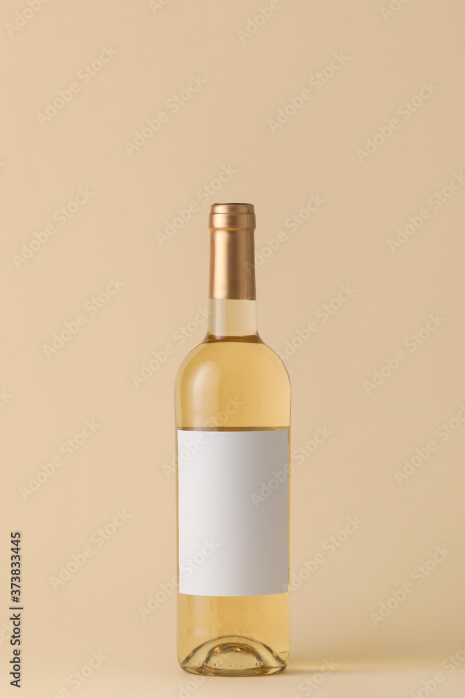 Bottle of wine with blank label on color background. Mockup for design Bottle of wine with blank label on color background. Mockup for design