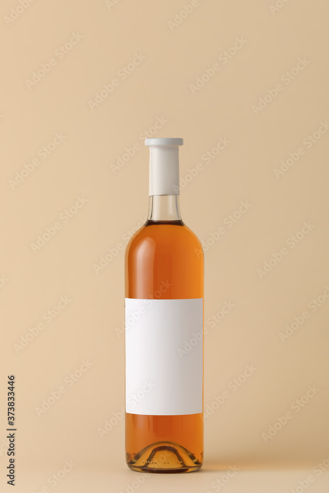 Bottle of wine with blank label on color background. Mockup for design Bottle of wine with blank label on color background. Mockup for design