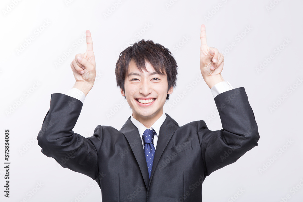 指差しをするビジネスマン