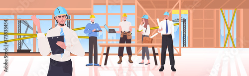 builders team at construction site engineers in helmets discussing during meeting repair service concept unfinished building interior horizontal vector illustration