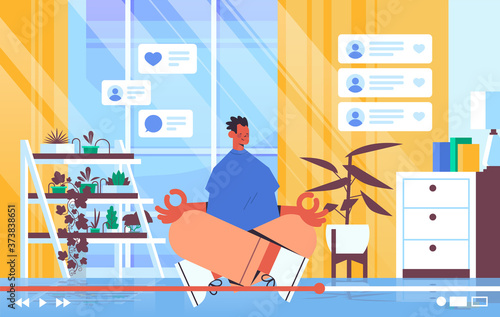 male fitness blogger recording online video blog live streaming blogging vlog popularity concept man vlogger sitting lotus pose living room interior horizontal full length vector illustration
