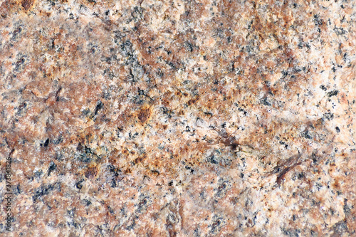 The stone texture. Fragment of the stone surface of the city pavement close-up.