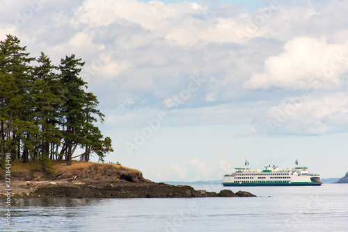 USA, Washington State, San Juan Islands. Washington State ferry rounds top of San Juan Island from Sidney Canada © Danita Delimont