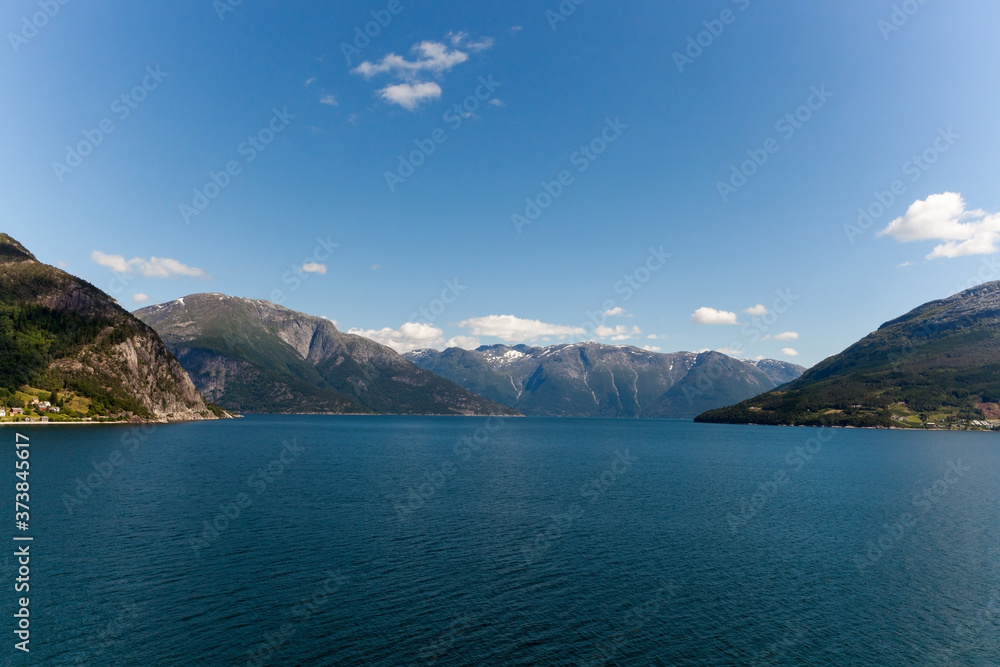 Fjord in Norway on sunny day. Beautiful norwegian landscape on clear day.