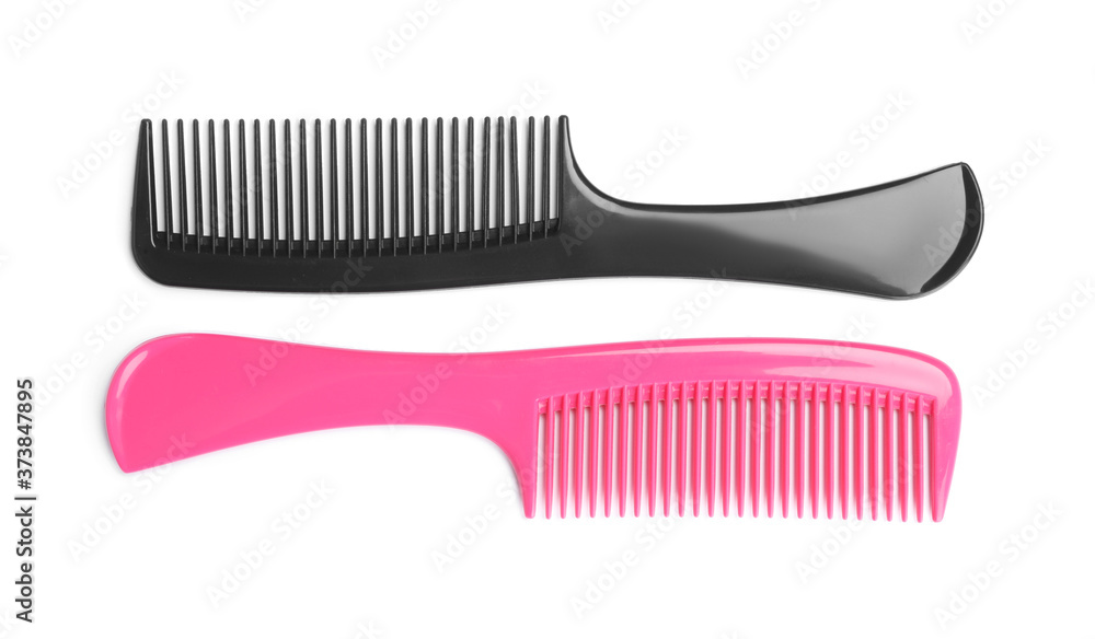 Modern hair combs isolated on white, top view Modern hair combs isolated on white, top view