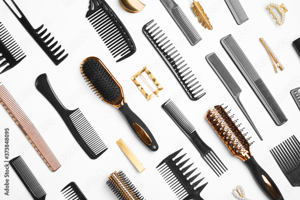 Composition with hair combs and brushes on white background, top view Composition with hair combs and brushes on white background, top view