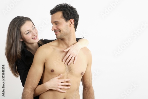 Woman hugging man from behind