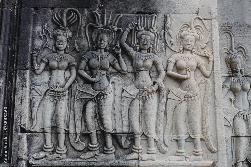 detail of a stone carving in angkor wat, cambodia