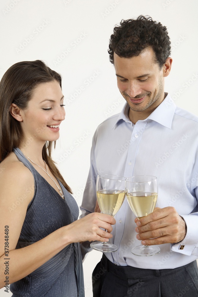 Man and woman toasting with champagne Man and woman toasting with champagne