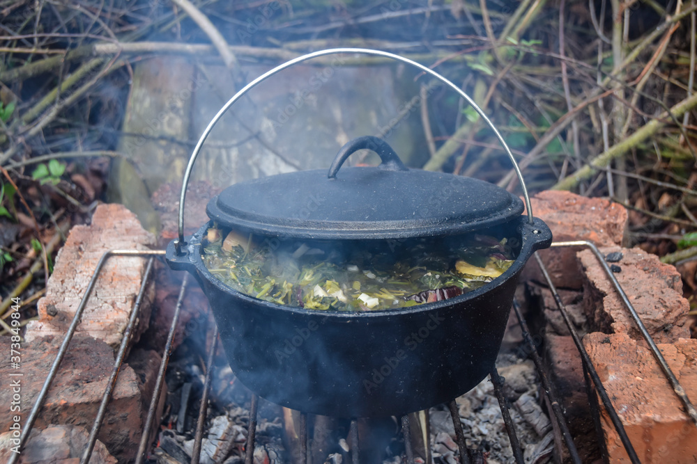 food on a hike in a cauldron green soup food on a hike in a cauldron green soup