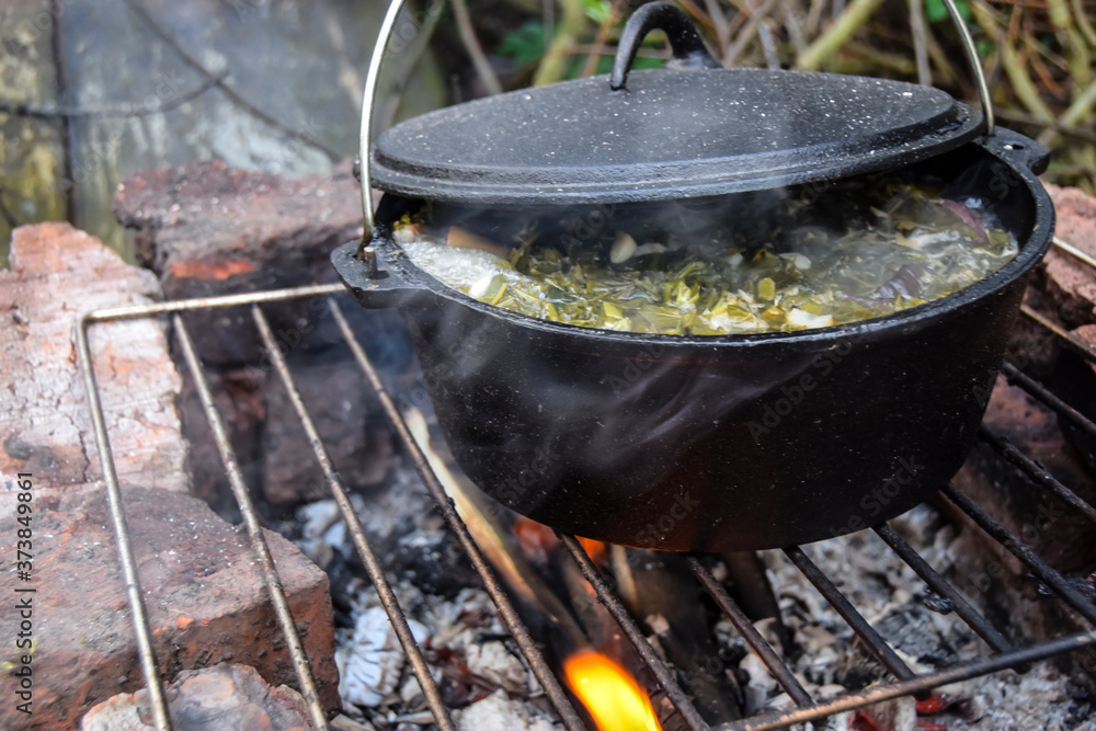 food on a hike in a cauldron green soup food on a hike in a cauldron green soup