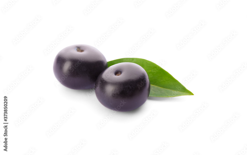 Fresh acai berries with leaf isolated on white Fresh acai berries with leaf isolated on white