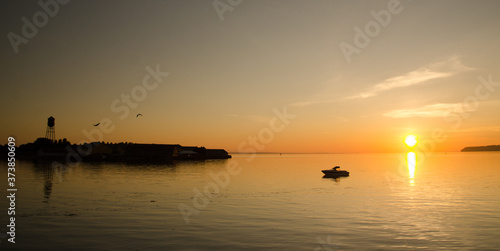 Sunset in Semiahmoo Bay with water tower in the background