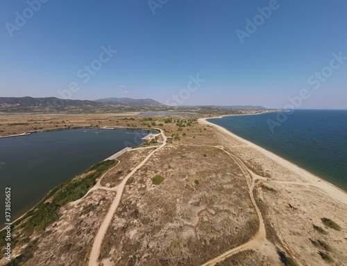 Aerial drone photo over the beach and small peninsula of the Strimonas river in North Greece, Macedonia photo