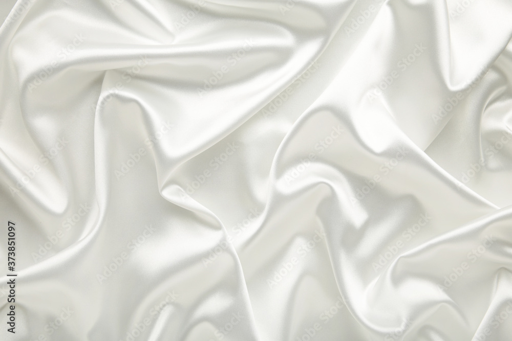 White satin fabric as a background. Top view White satin fabric as a background. Top view