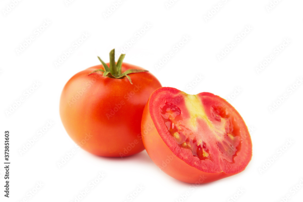 Tomatoes. Whole and a half isolated on white Tomatoes. Whole and a half isolated on white