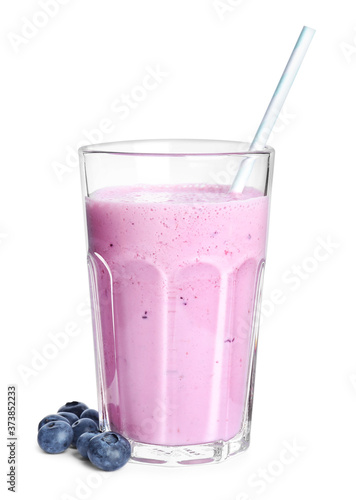Tasty blueberry milk shake and berries isolated on white