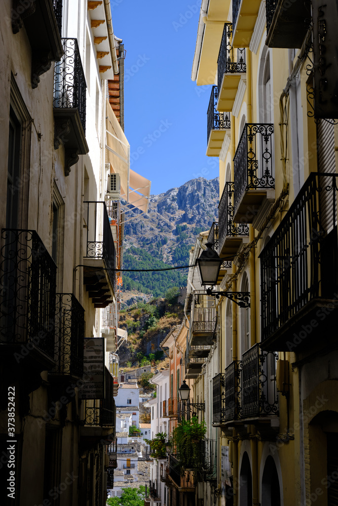 Narrow street with boxed mountain in Cazorla, Jaén