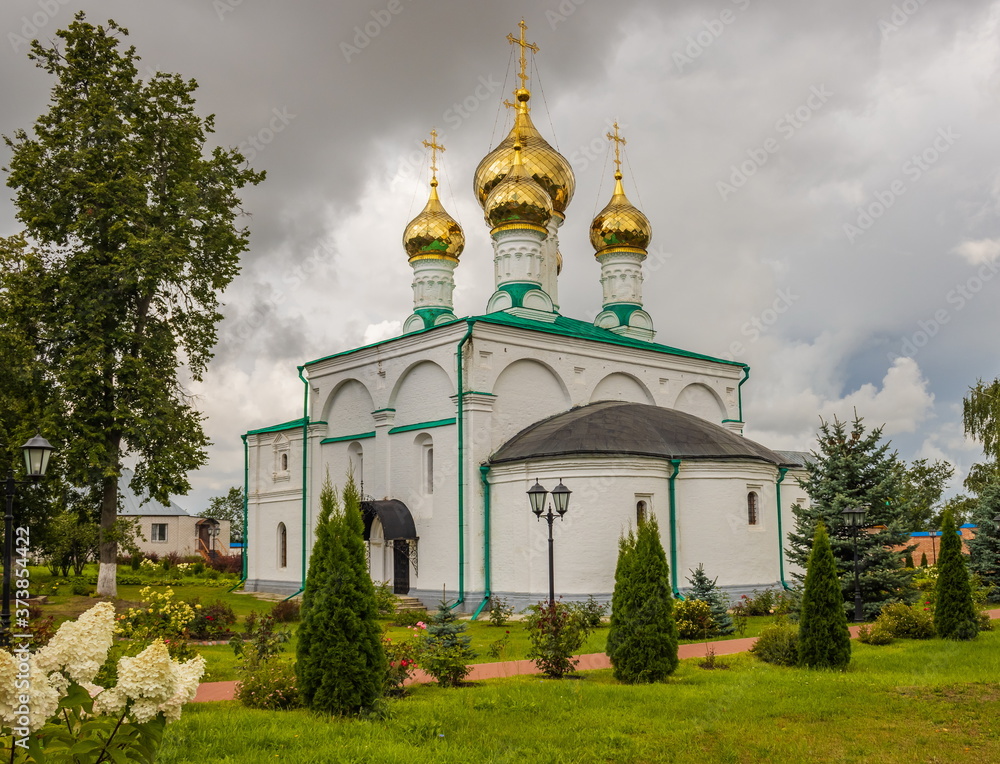 Summer rural landscape with a church. Ryazan. Russia.
