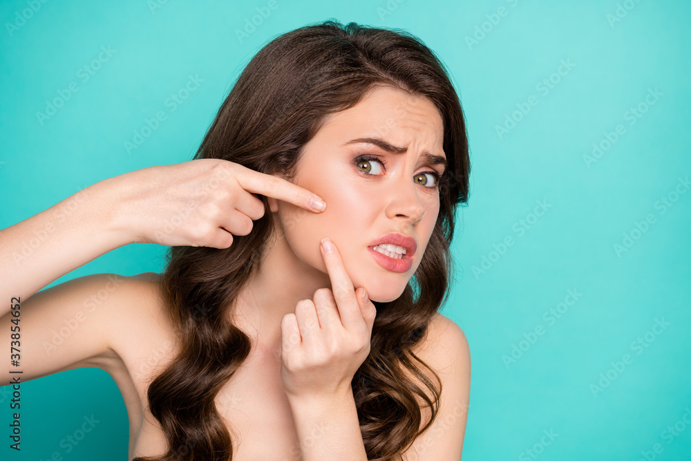 Close-up view portrait of her she nice attractive worried wavy-haired teen girl pushing pimple whelk clean clear sensitive cheek isolated bright vivid shine vibrant green turquoise color background Close-up view portrait of her she nice attractive worried wavy-haired teen girl pushing pimple whelk clean clear sensitive cheek isolated bright vivid shine vibrant green turquoise color background