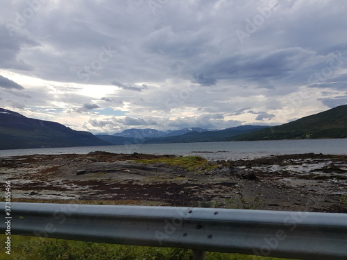 sea and fjord view from the top of the Kvenangsfjellet mountain in Nordreisa, northern Norway photo