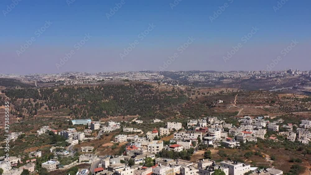 Palestinian Village Beit Surik with Jerusalem city in background
Aerial view, Jerusalem,August,2020,Israel
Palestinian Village Beit Surik with Jerusalem city in background
Aerial view, Jerusalem,August,2020,Israel
